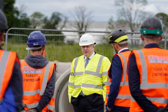 Boris Johnson speaking to workers at the site.
