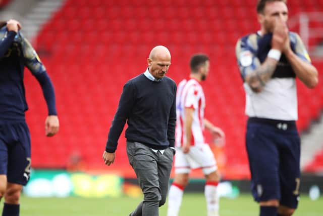 Barnsley manager Gerhard Struber (centre) walks off dejected after the defeat at Stoke City at the weekend. Picture: Nick Potts/PA.