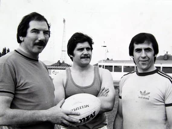 Bill Ramsey, left, is pictured with players Howard Budby and Peter Dunn in 1979, during his time as coach of New Hunslet. Picture by Yorkshire Post.