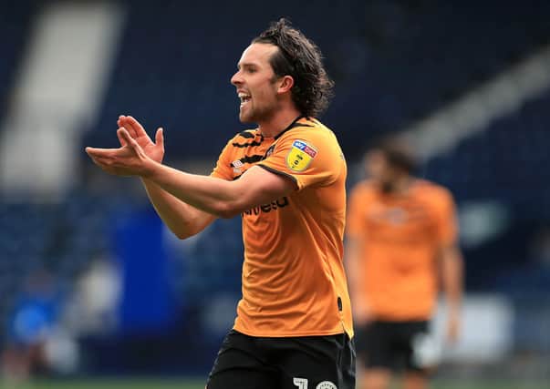ENERGY BOOST: Hull City's George Honeyman instructs his team-mates at The Hawthorns. Picture: Mike Egerton/PA