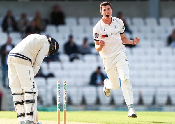 Yorkshire's Matthew Fisher celebrates taking the wicket of Kent's Daniel Bell-Drummond. (Picture: SWPIx.com)