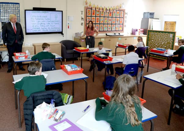 Boris Johnson during a recent visit to a school - but will education inequalities increase as a result of Covid-19?
