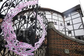 Tape covers the gates at Shakespeare's Globe theatre as a part of the Scene Change initiative, as the lifting of further lockdown restrictions in England comes into effect.