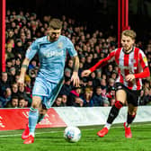RIVALS: Leeds United's Mateusz Klich in action at Brentford's Griffin Park in February