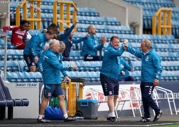 Middlesbrough manager Neil Warnock (right) celebrates victory with his coaching staff.