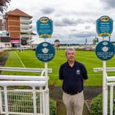 James Brennan, Head of Marketing and Sponsorship for York Racecourse, ensures all the necessary signage is in place for the meeting. Picture James Hardisty