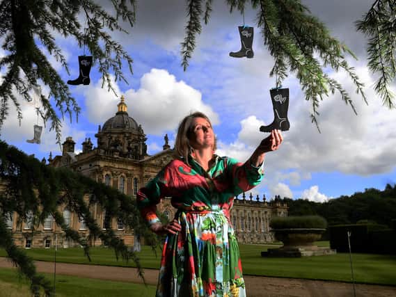 Harrogate artist Anita Bowerman, pictured with the Welly Art installation at Castle Howard. Picture by Simon Hulme