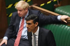 Chancellor Rishi Sunak during his economic statement as Boris Johnson listened intently.