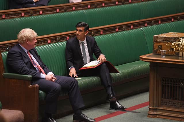Chancellor Rishi Sunak and Prime Minister Boris Johnson in the House of Commons.