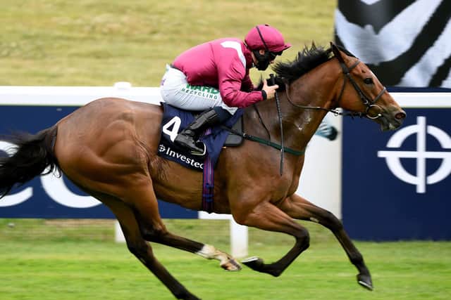 Safe Voyage - pictured winning at Epsom under Jason Hart - provided trainer John Quinn with his 1,000th winner.
