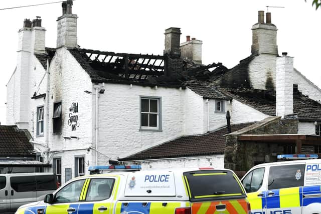 The roof of the pub has completely collapsed