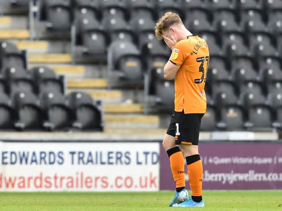 Hull City forward Keane Lewis-Potter holds his head in his hands after missing a late chance to salvage a point against Millwall. Picture: Getty Images