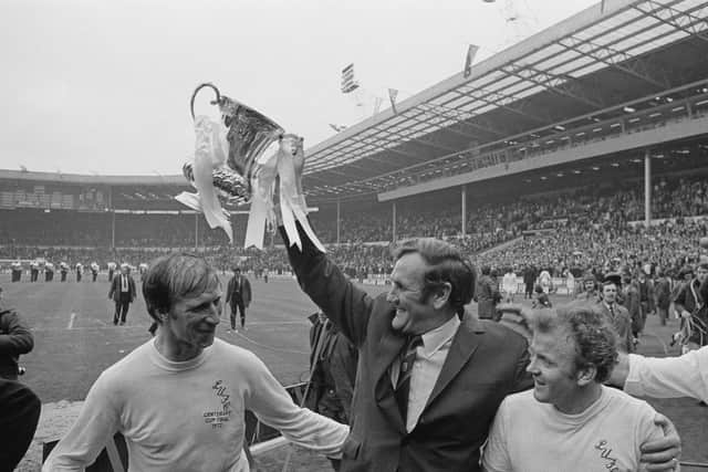 Jack Charlton (left), celebrates FA Cup success with Don Revie (centre) and Billy Bremner (right). Picture: Getty Images.