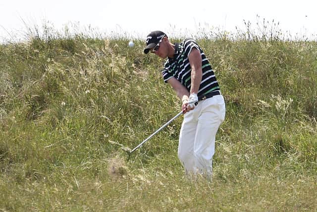 England's Danny Willett chips out of the rough during round two of the 2011 Open Championship at Royal St George's, Sandwich. PRESS ASSOCIATION Photo. Picture date: Friday July 15, 2011. See PA Story GOLF Open. Photo credit should read: David Davies/PA Wire. RESTRICTIONS: Use subject to restrictions. Editorial use only. No commercial use. Call +44 (0)1158 447447 for further information