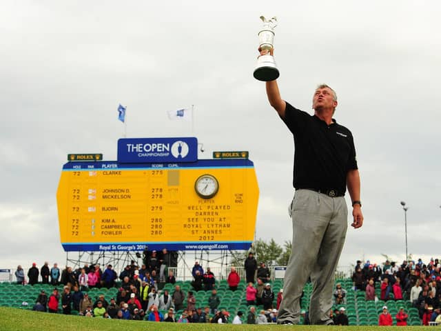 File photo dated 17/07/2011 of Darren Clarke holding the Claret Jug after winning the 2011 Open Championship during round four of the 2011 Open Championship at Royal St George's, Sandwich. PRESS ASSOCIATION Photo. Issue date: Saturday July 30, 2011. The PGA Championship will start on August 11th, at Atlanta Athletic Club, Georgia, USA. See PA Story GOLF USPGA. Photo credit should read: Owen Humphreys/PA Wire. Use subject to restrictions. Editorial use only. No commercial use. Call +44 (0)1158 447447 for further information