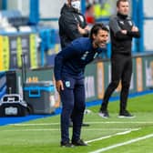 Huddersfield Town boss Danny Cowley tries to get his instructions across to his players on a frustrating night at the John Smith's Stadium on Friday night.  Picture Bruce Rollinson