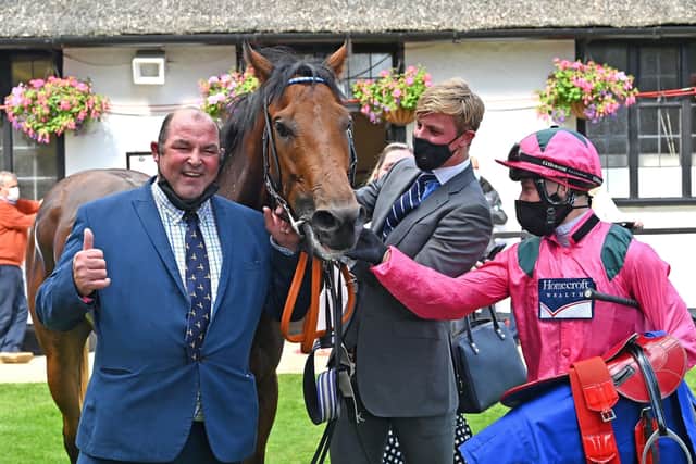 Trainer Roger Teal (left) and Oxted and Cieren Fallon (right) after winning The Darley July Cup Stakes on day three of The Moet and Chandon July Festival at Newmarket Racecourse. PA Photo. Issue date: Saturday July 11, 2020. See PA story RACING Newmarket. Photo credit should read: Hugh Routledge/PA Wire