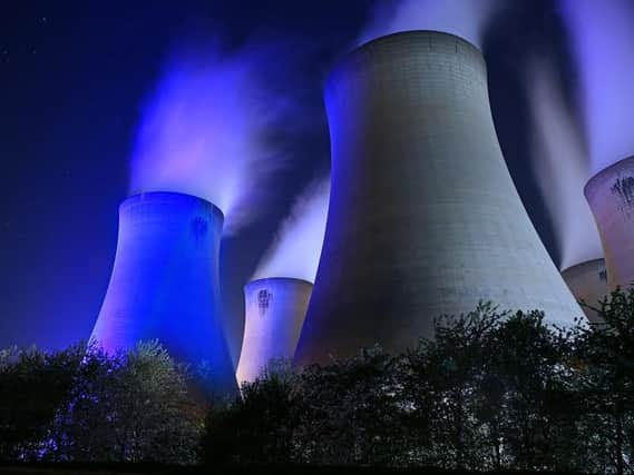 Drax Power Stations blue cooling tower lit up to thank the NHS