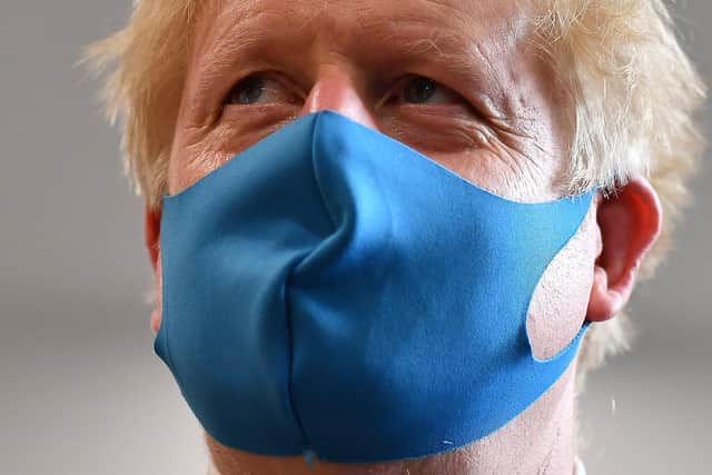 Boris Johnson has started wearing a face mask in public.