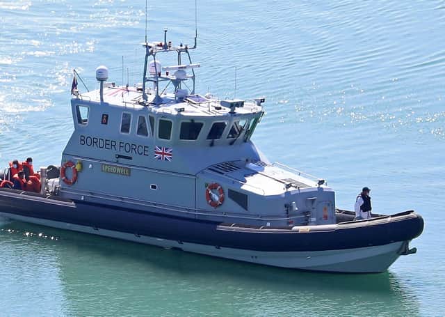 A group of people thought to be migrants are brought into Dover, Kent, following a number of small boat incidents in the English Channel.