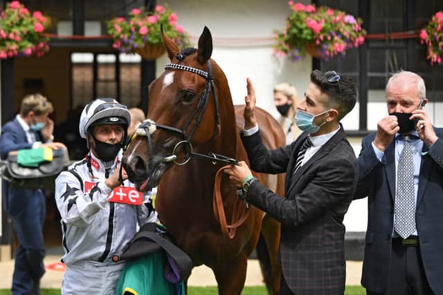 Dandalla and jockey Ben Curtis after winning the Duchess Of Cambridge Stakes during day two of The Moet and Chandon July Festival at Newmarket Racecourse. PA Photo. Issue date: Friday July 10, 2020. See PA story RACING Newmarket. Photo credit should read: George Selwyn/PA Wire