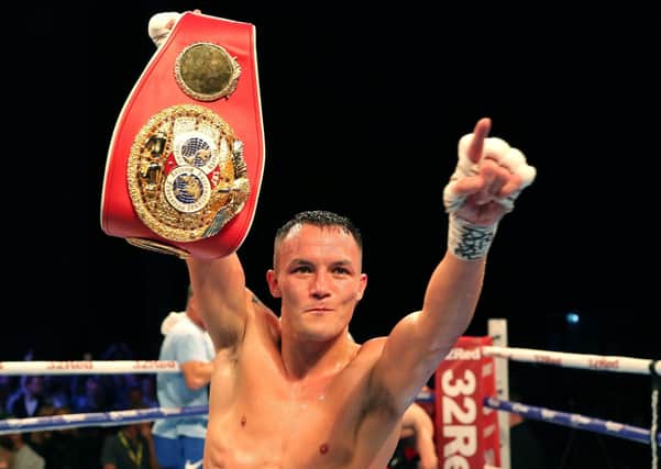 Josh Warrington celebrates defeating Sofiane Takoutch in the International Boxing Federation World Feather Title at First Direct Arena, Leeds. PA Photo. Picture date: Saturday October 12, 2019. See PA story BOXING Leeds. Photo credit should read: Richard Sellers/PA Wire