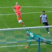 Huddersfield Town goalkeeper Jonas Lossl saves a shot from Sheffield Wednesday's Kadeem Harris (not in picture). Picture: PA