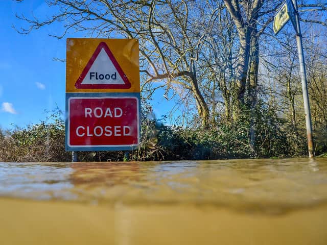 A road closed due to flooding. Photo: PA