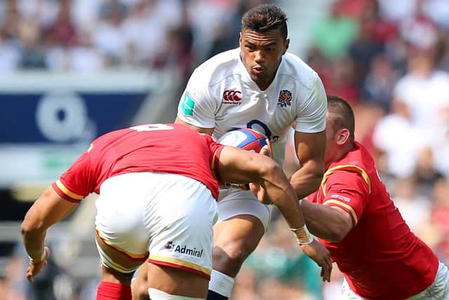 England's Luther Burrell (centre) looks to break through the Welsh line during the Old Mutual Wealth Cup match at Twickenham Stadium, London. PRESS ASSOCIATION Photo. Picture date: Sunday May 29, 2016. See PA story RUGBYU England. Photo credit should read: Gareth Fuller/PA Wire. RESTRICTIONS: Editorial use only, No commercial use without prior permission, please contact PA Images for further information: Tel: +44 (0) 115 8447447.