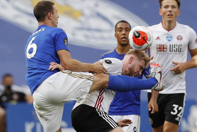 Oli McBurnie stoops for the ball. Picture: Darren Staples/Sportimage