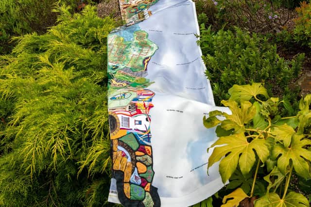 In his garden, Academic and designer David Morrish the quilt he created with the help of a Sheffield quilting society of Windermere lake as part of his academic project inspired by the waste he saw as he prepared for a marathon around the lake last year.
 Picture Bruce Rollinson