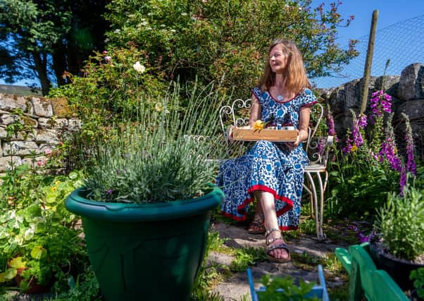 Alice Lavin, founder of Annwyn Botanicals a natural botanical skincare range in the garden of her housein North Yorkshire