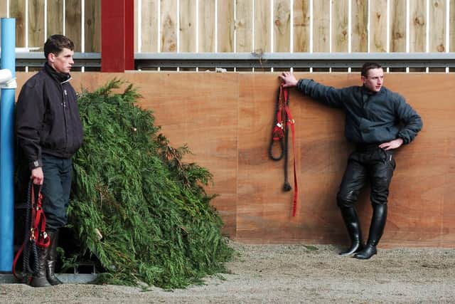 PJ McDonald (right) at Ferdy Murphy's West Witton stables in 2006. On the left is Keith Mercer who had won the 2005 Scottish National on Joes Edge. Photo: Bruce Rollinson.