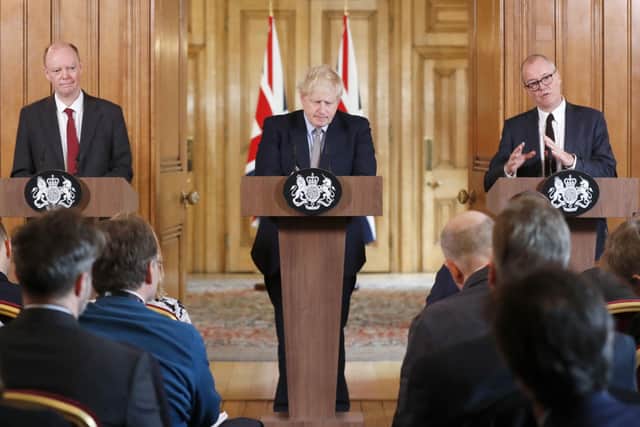 Boris Johnson with Professor Chris Whitty (left) and Sir Patrick Vallance (right) at a Downing Street press conference in March.