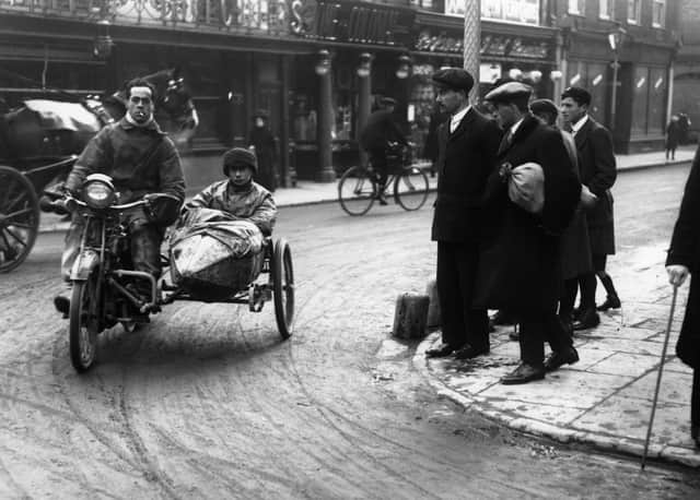 H C Mills of Blackburn entering Salisbury on his Premier motorcycle with sidecar on the Motor Car Club London to Exeter run.   (Photo by Topical Press Agency/Getty Images)