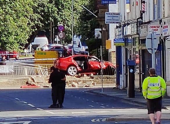 The damaged car in Brighouse town centre