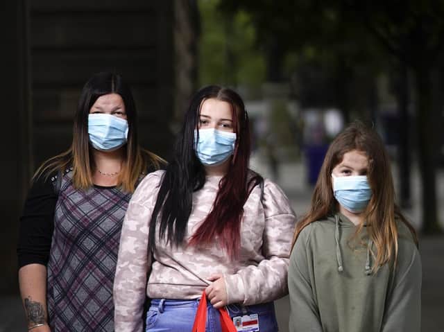 People should wear face masks in enclosed spaces and where social distancing isn't possible. (Photo by Christopher Furlong/Getty Images)