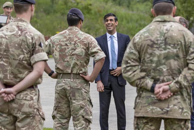 Chancellor of the Exchequer Rishi Sunak meets soldiers during a visit to Catterick Garrison in North Yorkshire, following the announcement that more than 5,000 military personnel and their families will have their homes modernised. Pic: PA