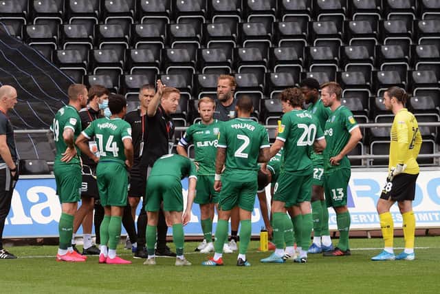 Sheffield Wednesday boss Garry Monk talks to his players during a water breakin theChampionship clash at Swansea City. Picture: Steve Ellis