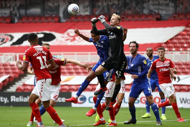 Punch: Middlesbrough goalkeeper Aynsley Pears clears the ball.