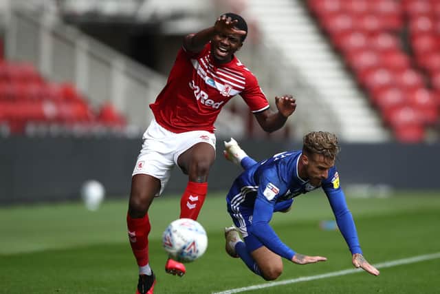 Challenge: Middlesbrough's Anfernee Dijksteel and Cardiff City's Joe Bennett battle for the ball.