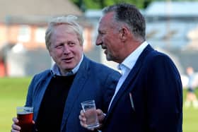 Boris Johnson talking to Sir Ian Botham, prior to a knock-about during a visit to Chester Le Street Cricket Club in County Durham