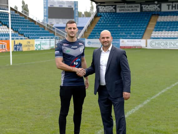 Craig Hall, left, with Featherstone Rovers CEO Davide Longo (PIC: FEATHERSTONE ROVERS)