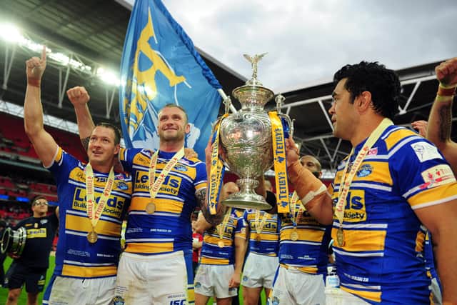 Danny McGuire, Jamie Peacock and Kylie Leuluai after Leeds Rhinos won the 2014 Challenge Cup (Picture: Steve Riding)