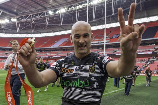 Hull FC's Danny Houghton celebrates to the fans after his side's victory over Wigan in the Ladbrokes Challenge Cup final in 2017 (Picture: SWPix.com)