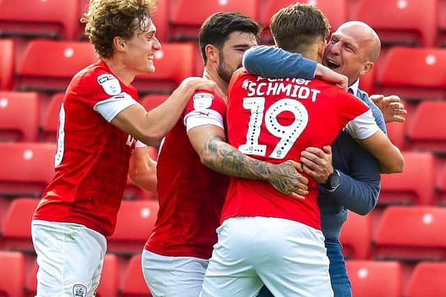 Barnsley FC head coach Gerhard Struber celebrates with goalscorer Patrick Schmidt after the Reds' dramatic 1-0 win over Nottingham Forest. PICTURE: TONY JOHNSON.