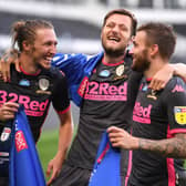 Just champion: Luke Ayling of Leeds United, Stuart Dallas of Leeds United and Liam Cooper of Leeds United celebrate. (Picture: Laurence Griffiths/Getty Images)
