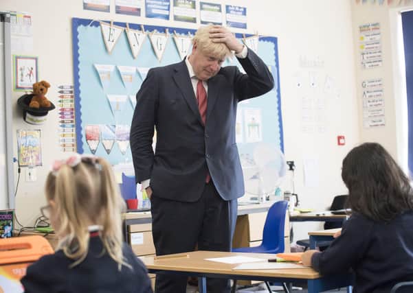 Prime Minister Boris Johnson during a visit to The Discovery School in West Malling, Kentt, at the start of a week that marks his first anniversary as Prime Minister.