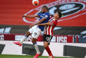 CHALLENGE: John Egan competes for the ball with Everton's Djibril Sidebe