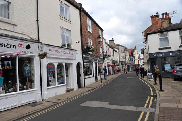 Social distancing measures are in place in towns like Knaresborough. Photo: James Hardisty.